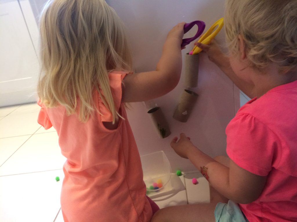 using the finished pom pom marble run